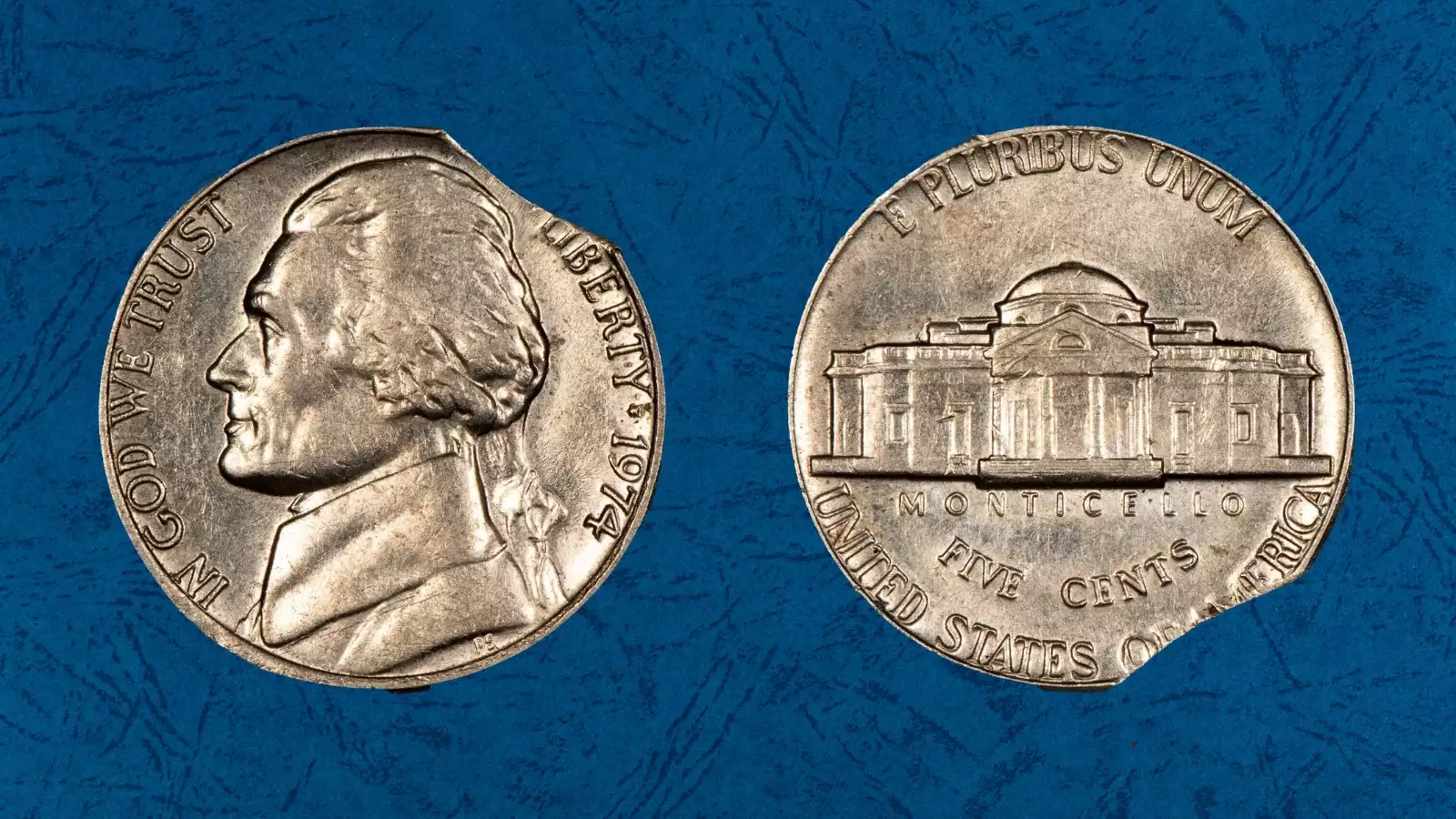 1974 nickel clipped planchet error showing crescent-shaped missing section on coin edge